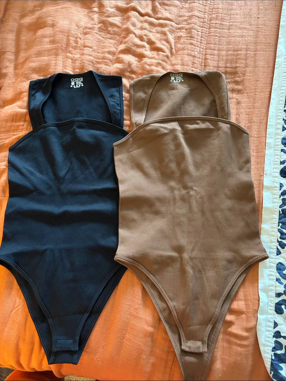 NWOT Pair of Ribbed Tank One-Piece Bodysuits in Black and Brown